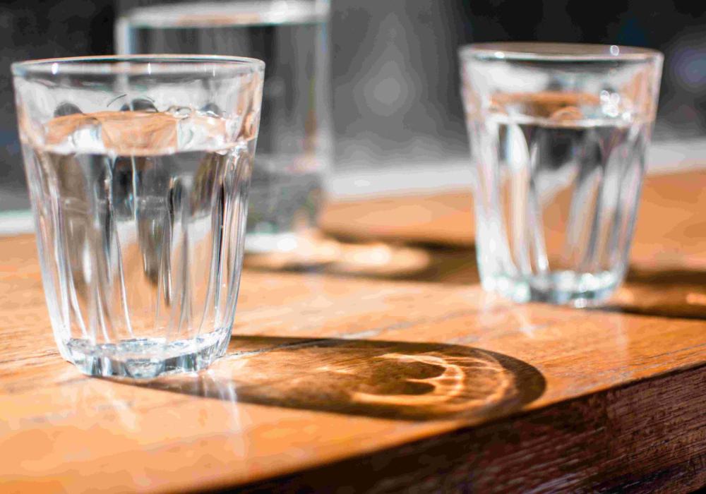Glasses of water filled from a water filter cooler in Geelong office